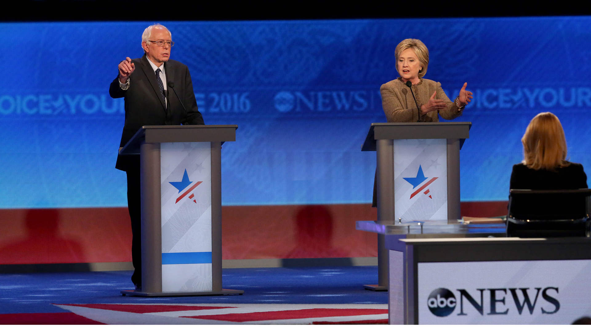 Democratic president candidates Bernie Sanders and Hillary Clinton debate at Saint Anselm College