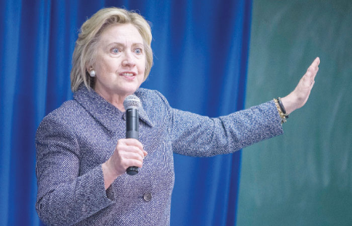 Democratic presidential candidate Hillary Clinton speaks to volunteers at a United Steelworkers Union Hall in Bettendorf Iowa on Tuesday. — AFP