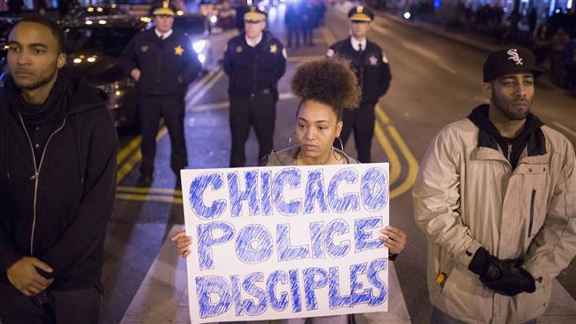 Demonstrators march through downtown Chicago Illinois