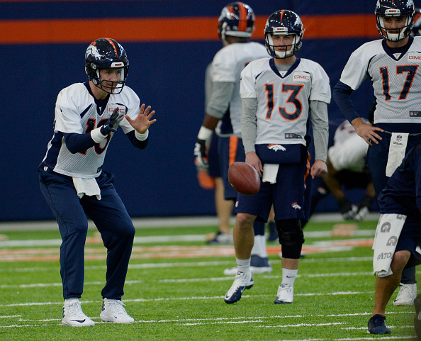 Denver Broncos QB's Peyton Manning Brock Osweiler