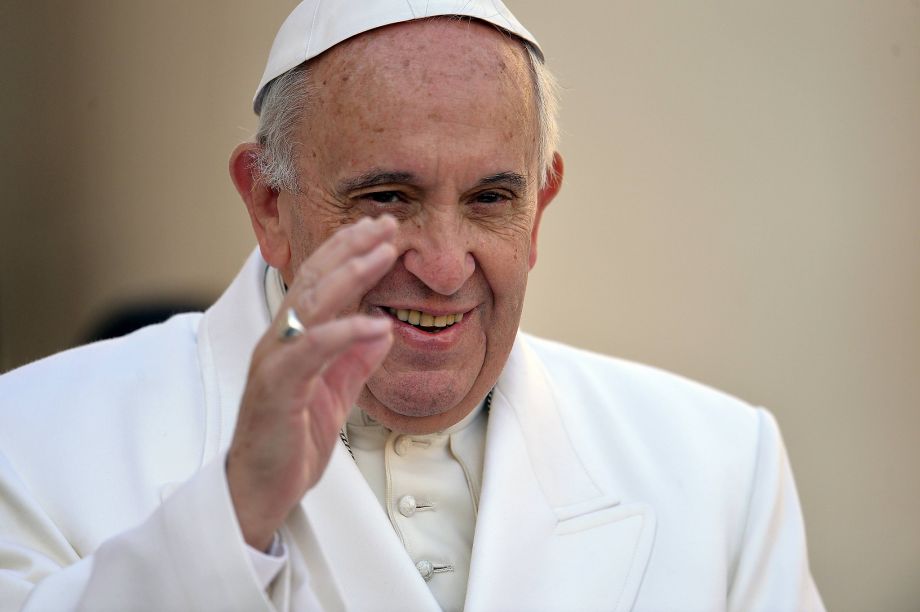 Pope Francis waves at St Peter's Square