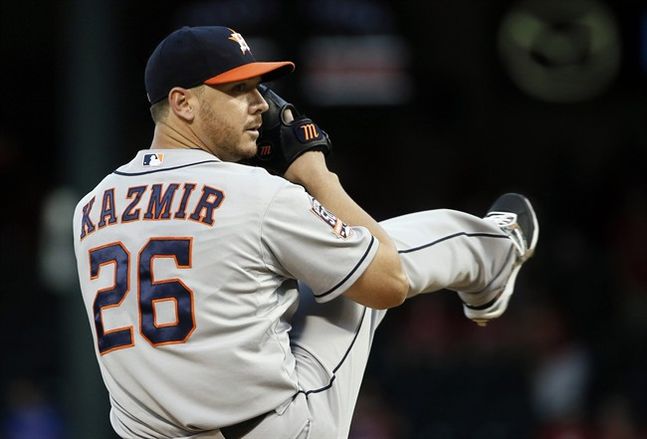 Houston Astros starting pitcher Scott Kazmir works against the Texas Rangers during a baseball game in Arlington Texas. Kazmir has agreed to a three-year contract with the Los Angeles Dodgers in a deal ann