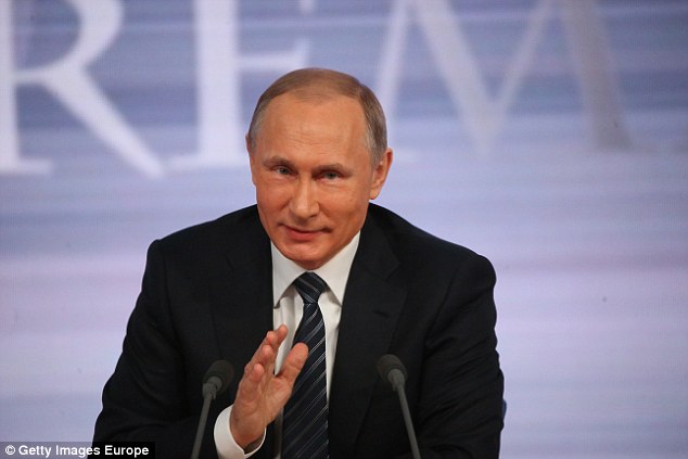 Putin said that Trump was the'absolute front-runner of the presidential race which provoked criticism from opponents who said the Russian leader was responsible for the deaths of the Dutch airliner brought down in Ukraine. Above Putin speaks during