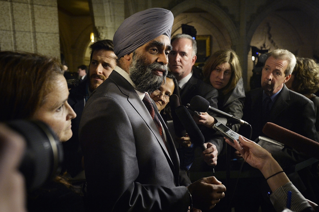 Defence Minister Harjit Sajjan scrums with media in Ottawa on Monday