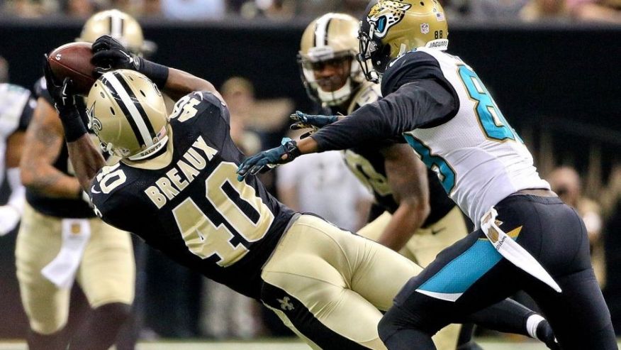 Dec 27 2015 New Orleans LA USA New Orleans Saints cornerback Delvin Breaux intercepts a pass in front of Jacksonville Jaguars wide receiver Allen Hurns during the second quarter of a game at the Mercedes Benz Superdome. Mandatory Credit De