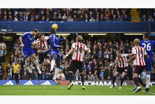 Branislav Ivanovic left scores Chelsea's first goal on a header