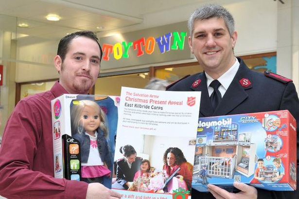 East Kilbride News

Toy Town manager Jonathan Stevenson with EK Salvation Army Captain Stephen Baker