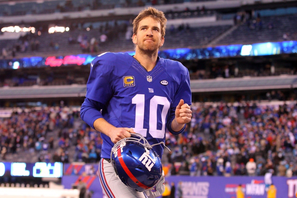 Eli Manning leaves the field after Sunday's loss- Brad Penner-USA TODAY Sports