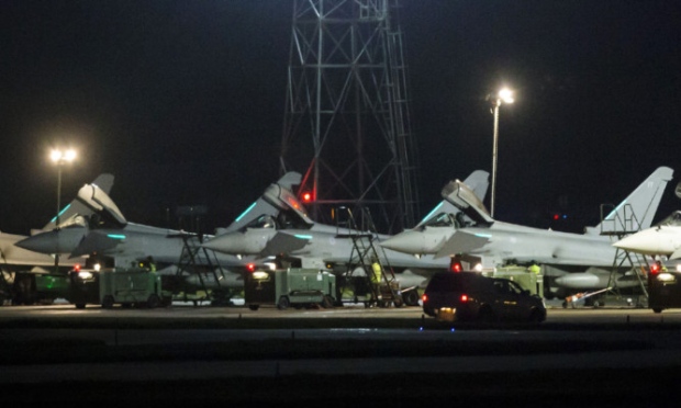 Eurofighter Typhoon jets at RAF Lossiemouth are prepared for