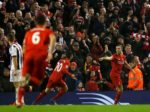 Jordan Henderson celebrates scoring against West Brom