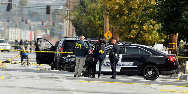 FBI San Bernardino City and San Bernardino County Sheriff's officials continue their investigation into the mass shooting