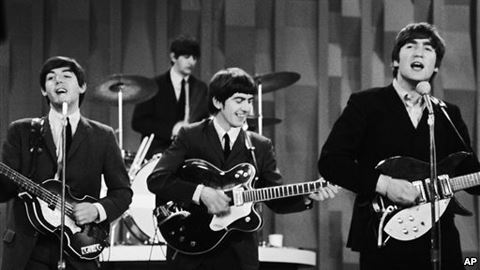 FILE- The Beatles perform on CBS&#39'Ed Sullivan Show in New York Feb. 9 1964