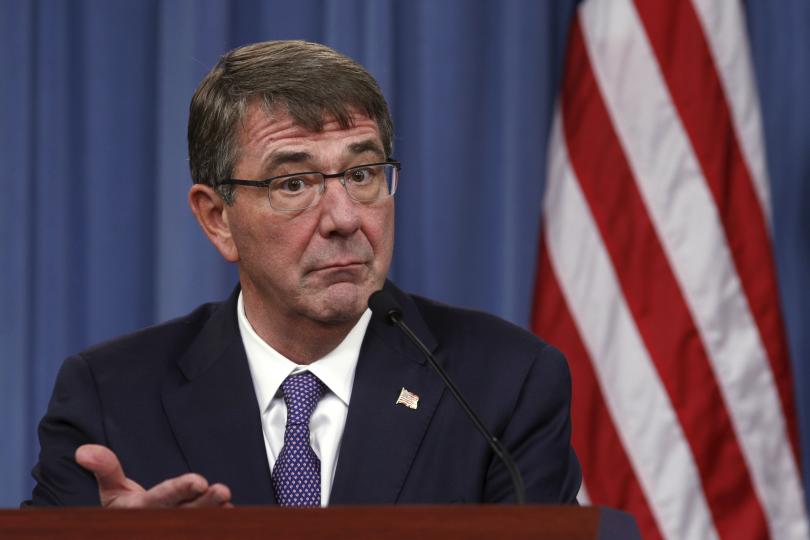 U.S. Secretary of Defense Ash Carter gestures during a press conference