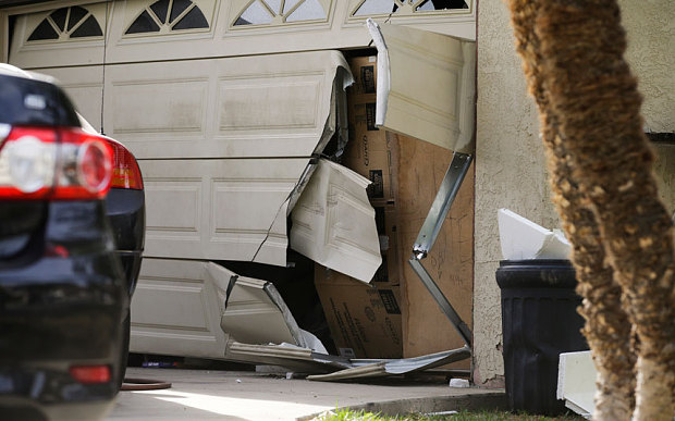 Enrique Marquez's home is broken in after an FBI raid in Riverside California