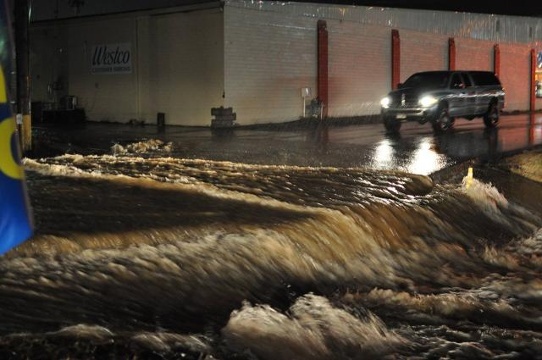 Flood waters rose Saturday night in Neosho