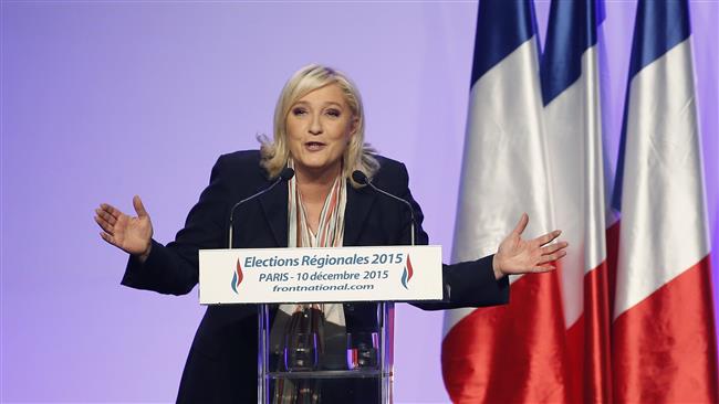 French far-right Front National leader Marine Le Pen addresses supporters during a campaign rally in Paris