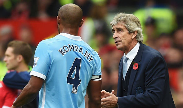 Kompany and Pellegrini on the touchline