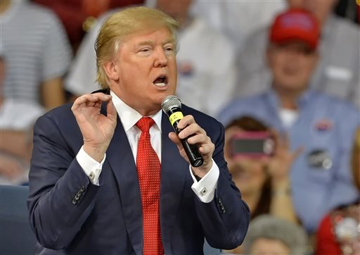 Republican presidential candidate Donald Trump speaks at a town hall meeting in the Convocation Center on the University of South Carolina Aiken campus in Aiken S.C. Trump's supporters don't see his plan to ban Muslims from