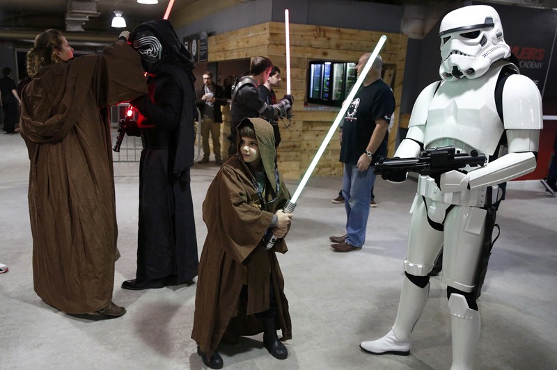 Fans dressed as Star Wars characters arrive at the'For The Love of The Force fan convention in Manchester northern England