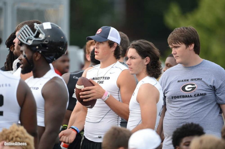 Georgia quarterback commits Jacob Eason and Bailey Hockman watch drills during Dawg Night