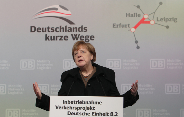 German Chancellor Angela Merkel delivers a speech during the opening ceremony of the new high-speed rail line between Erfurt and Halle  Leipzig at the central