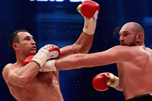 Wladimir Klitschko in action against Tyson Fury during their WBA IBF & WBO Heavyweight Title match at the Esprit Arena Dusseldorf Germany