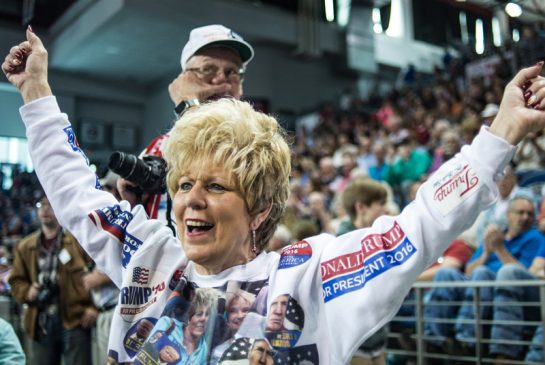 A Donald Trump supporter cheers the Republican frontrunner during a Dec. 12 town hall meeting in Aiken South Carolina