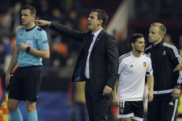 Gary Neville gestures on the sidelines