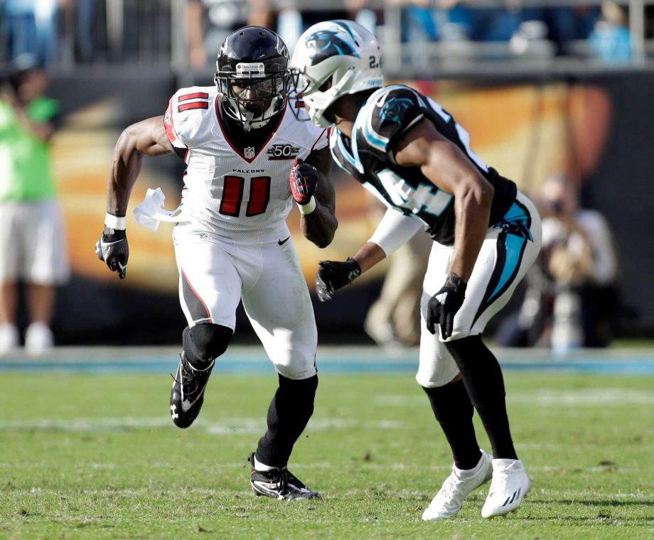 Atlanta Falcons Julio Jones faces off against Carolina Panthers Josh Norman in the second half of an NFL football game in Charlotte N.C. When Jones takes off from the line of scrimmage it cre