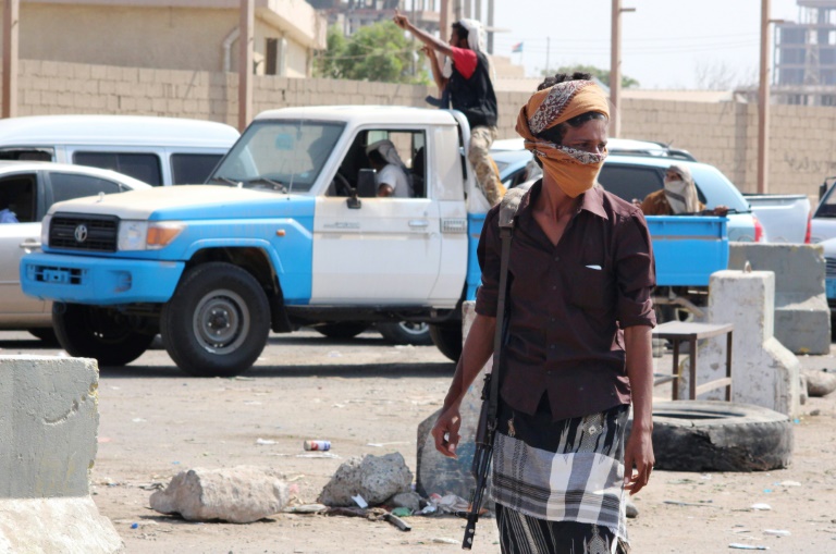 AFP File Saleh al-ObeidiYemeni fighters of the Popular Resistance Committees supporting forces loyal to Yemen's Saudi-backed President Abedrabbo Mansour Hadi patrol a street in the southern port city of Aden