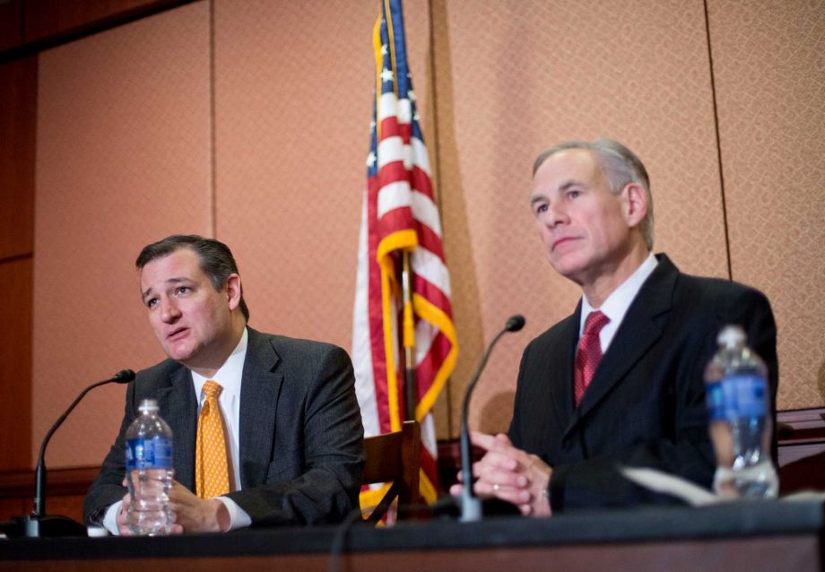 Republican presidential candidate Sen. Ted Cruz R-Texas left and Texas Gov. Greg Abbott right speak about the resettlement of Syrian refugees in the U.S. during their joint news conference on Capitol Hill in Washington Tuesday Dec. 8 2015. (AP Ph