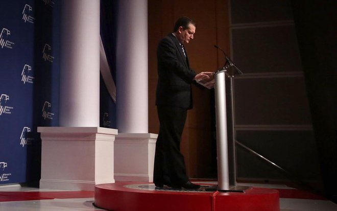 Republican presidential candidate Sen. Ted Cruz leads a moment of silence for victims of the San Bernardino Calif. shooting prior to his address to the Republican Jewish Coalition at Ronald Reagan Building and International Trade Center on Thu