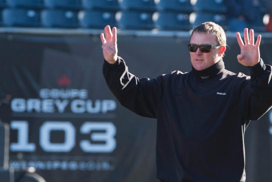 Edmonton Eskimos head coach Chris Jones takes part in a team walk through in Winnipeg Man. Saturday Nov. 28 2015. The Edmonton Eskimos will play the Ottawa Redblacks in the 103rd Grey Cup Sunday