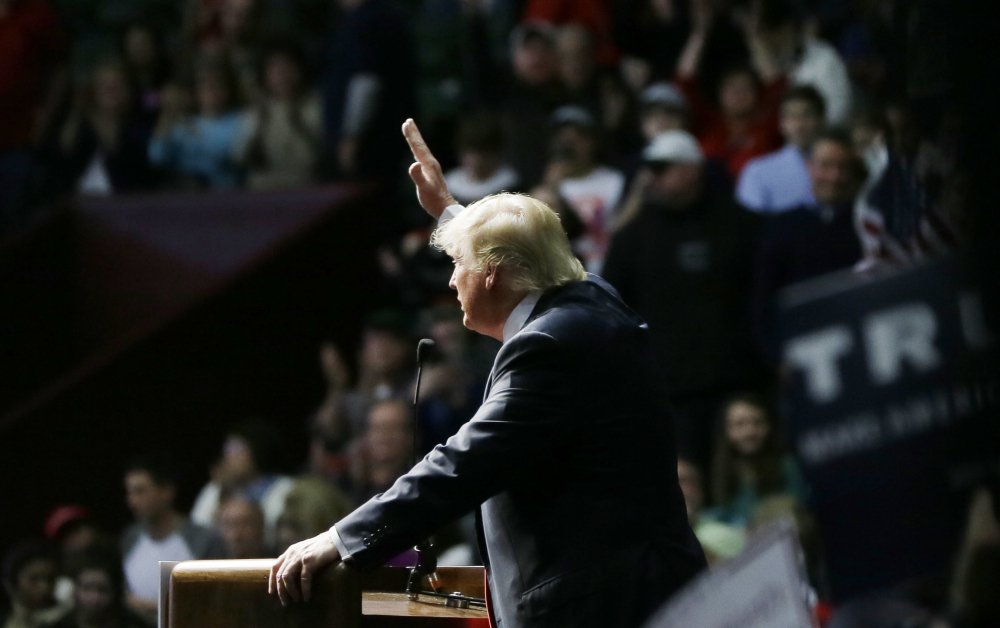 Donald Trump addressing supporters at a campaign rally Monday in Grand Rapids Mich. used crude language to attack Democratic front-runner Hillary Clinton saying “she got schlonged” in the 2008 Democratic primary race