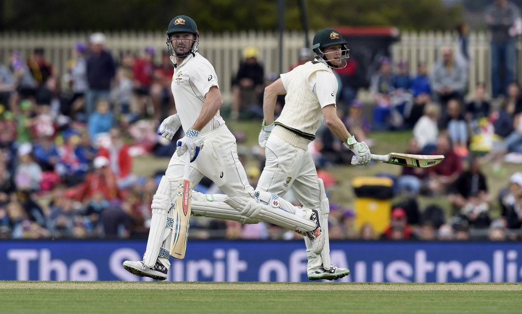 Australia's Shaun Marsh left and Adam Voges run between wickets against the West Indies during their cricket test match in Hobart Australia Friday Dec. 11 2015