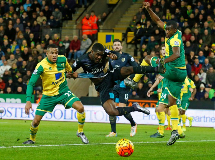 AFP  Lindsey ParnabyArsenal's striker Joel Campbell vies with Norwich City's defender Martin Olsson and Norwich City's defender Sebastien Bassong during the English Premier League football match at Carrow Road in Norwich Engla