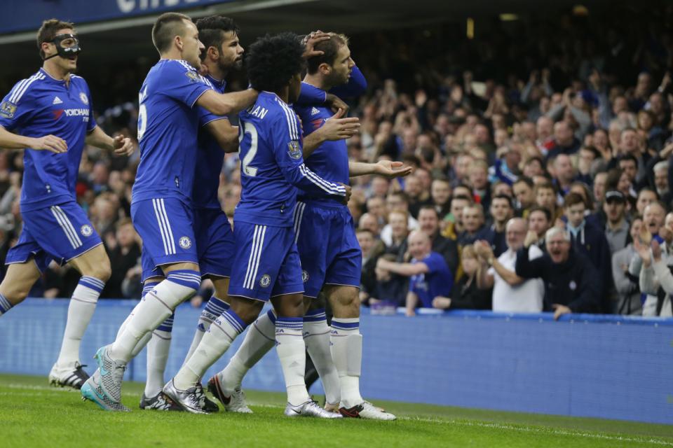 Chelsea's Branislav Ivanovic right celebrates scoring his side's first goal during the English Premier League soccer match between Chelsea and Sunderland at Stamford Bridge stadium in London Saturday Dec. 19 2015