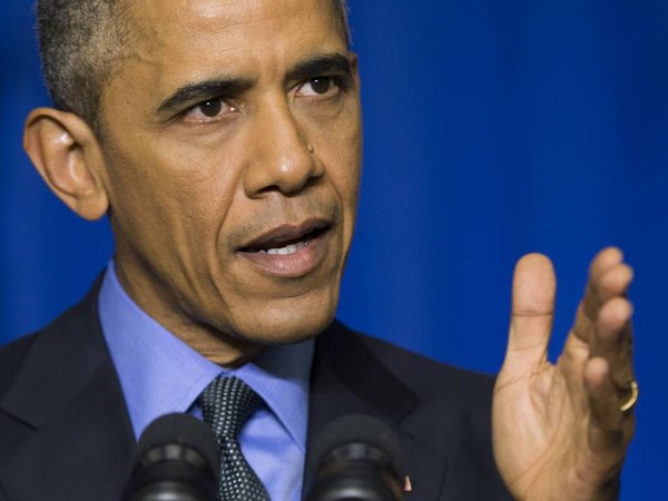 President Barack Obama speaks during a news conference at the Organization for Economic Cooperation and Development Centre in Paris on Tuesday Dec. 1 2015. Obama discussed the COP21 climate change summit and the threat of terrorism from the Islamic S