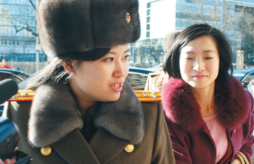 Hyon Song-wol who leads the North Korean pop band Moranbong enters a hotel in Beijing on Friday. /Yonhap