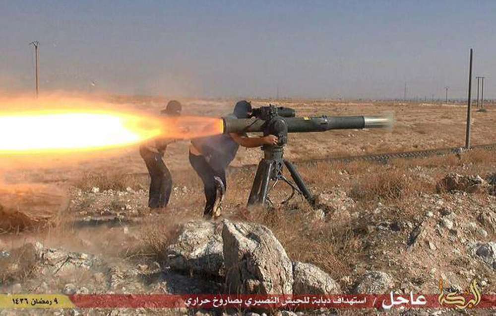 State militants fire an anti-tank missile in Hassakeh northeast Syria