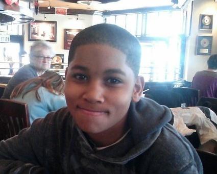 Image Text
 SHOT BY POLICE Schoolboy Tamir Rice