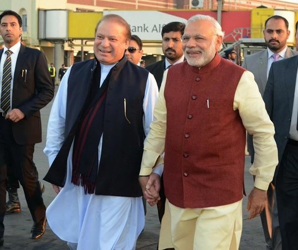 In a rare show of friendship India Prime Minister Narendra Modi with his Pakistani counterpart Nawaz Sharif in Lahore Pakistan on 25 December