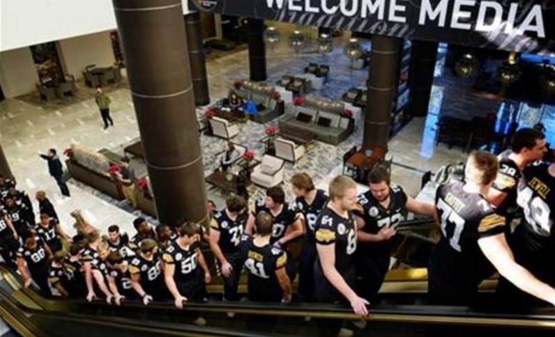 The Iowa football team arrives for Media Day at The L.A. Downtown Hotel in Los Angeles on Tuesday Dec. 29 2015. Iowa is scheduled to play Stanford in the Rose Bowl NCAA college football game on New Year's Day