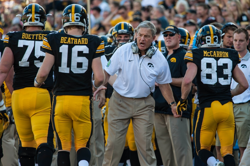 Sep 26 2015 Iowa City IA USA Iowa Hawkeyes head coach Kirk Ferentz congratulates quarterback C.J. Beathard and wide receiver Riley Mc Carron during the second quarter against the North Texas Mean Green at Kinnick Stadium. Mandatory Credit J