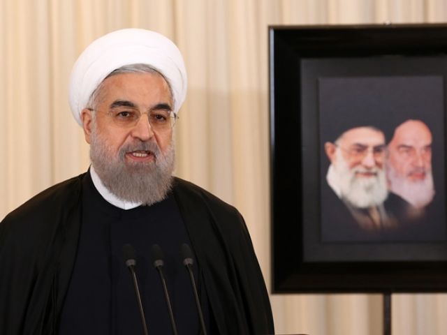 Iranian President Hassan Rouhani speaks during a press conference in his office in Tehran