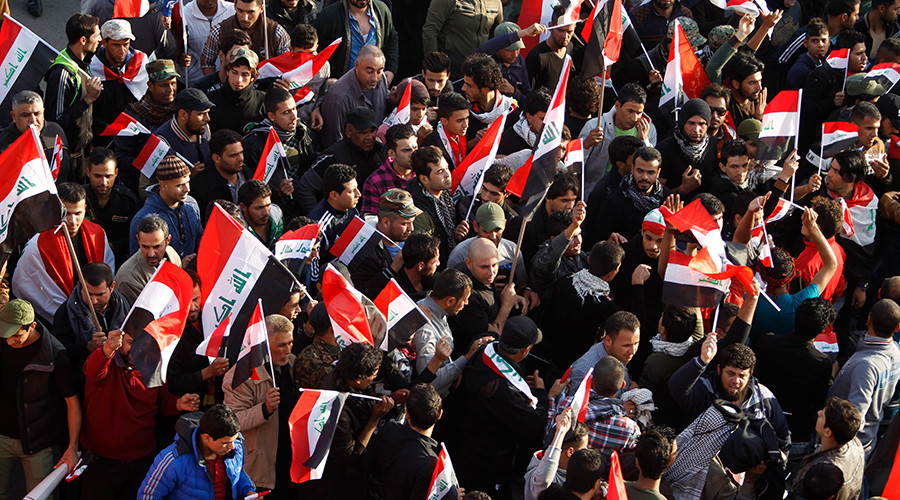 Protesters shout slogans during a demonstration against Turkish military deployment in Iraq at Tahrir Square in central Baghdad Iraq