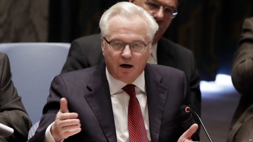 FILE- Russia's U.N. ambassador Vitaly Churkin shown addressing the Security Council in May 2014 says Turkey acted'recklessly in deploying troops to Iraq