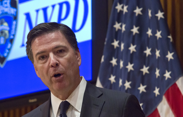 FBI Director James Comey speaks during a press conference after addressing the NYPD Shield Conference at NYPD headquarters Wednesday Dec. 16 2015 in New