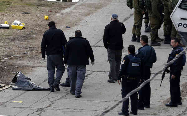 A Palestinian motorist has been shot dead after ramming a Jerusalem bus stop and injuring nine people