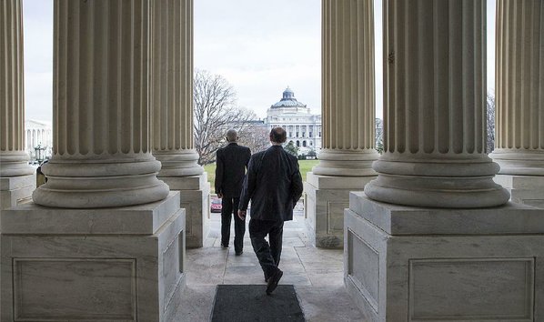 J. SCOTT APPLEWHITE						Credit AP				House members leave the Capitol on Friday after approving a short-term extension for government spending